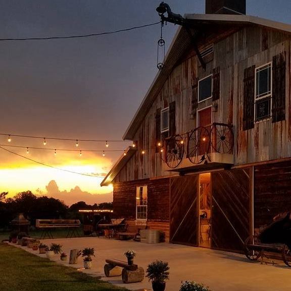 exterior of jones barn at sunset