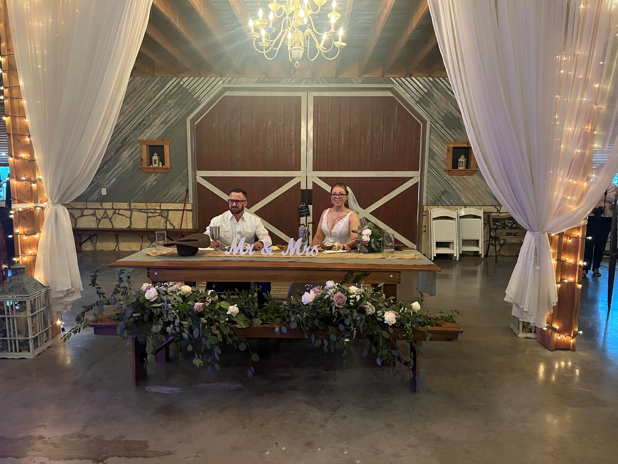 bride and groom's table at wedding reception